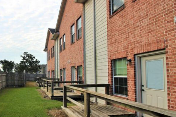 All student house apartments equipped with back patio and yard space